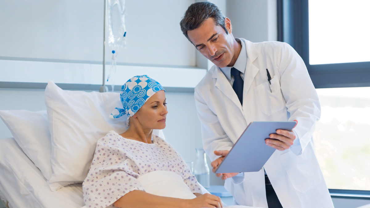 Doctor With Cancer Patient